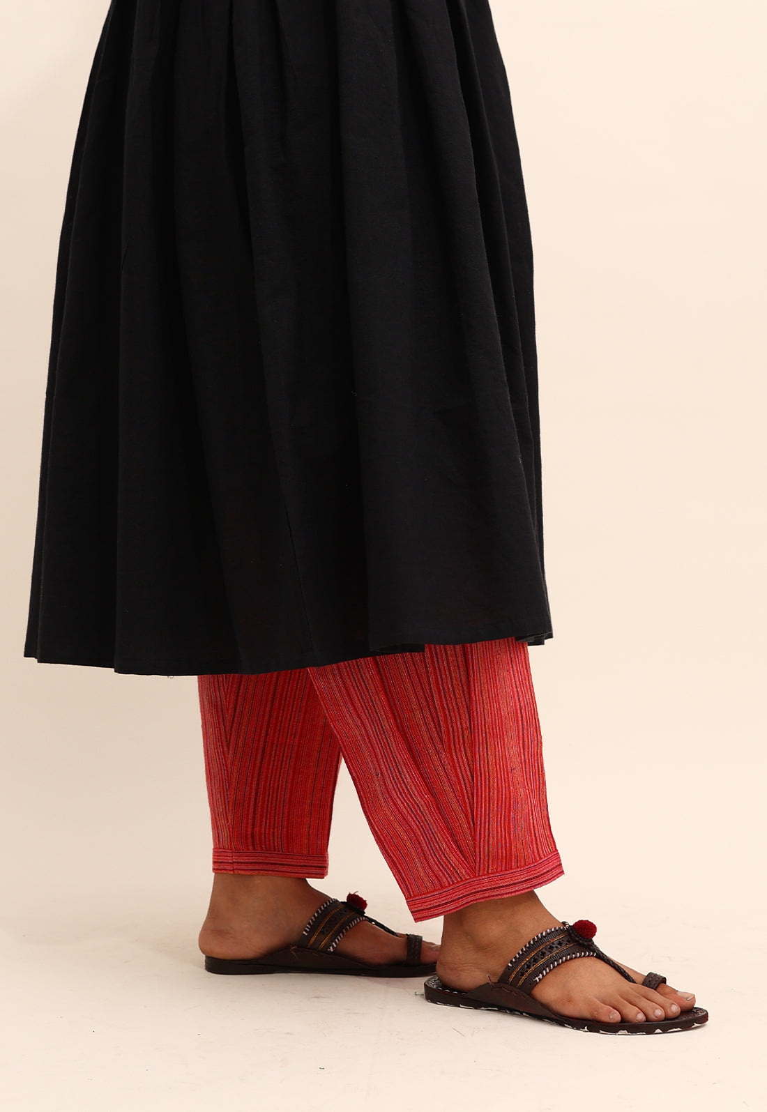 Solid Black Box-Pleated Co-ord Set With Red Pants