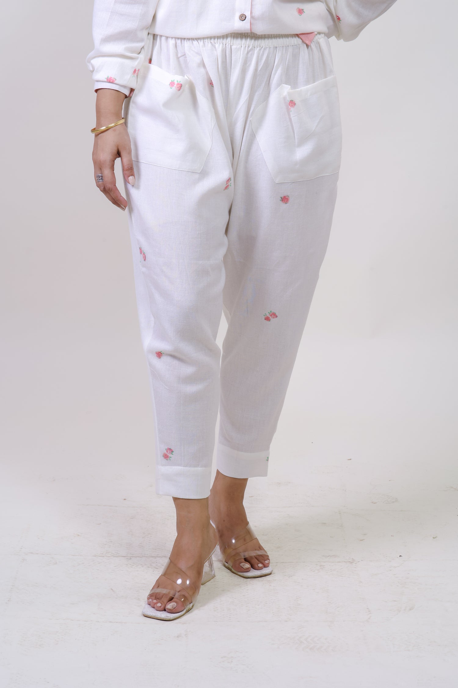 White bloom carrot pants