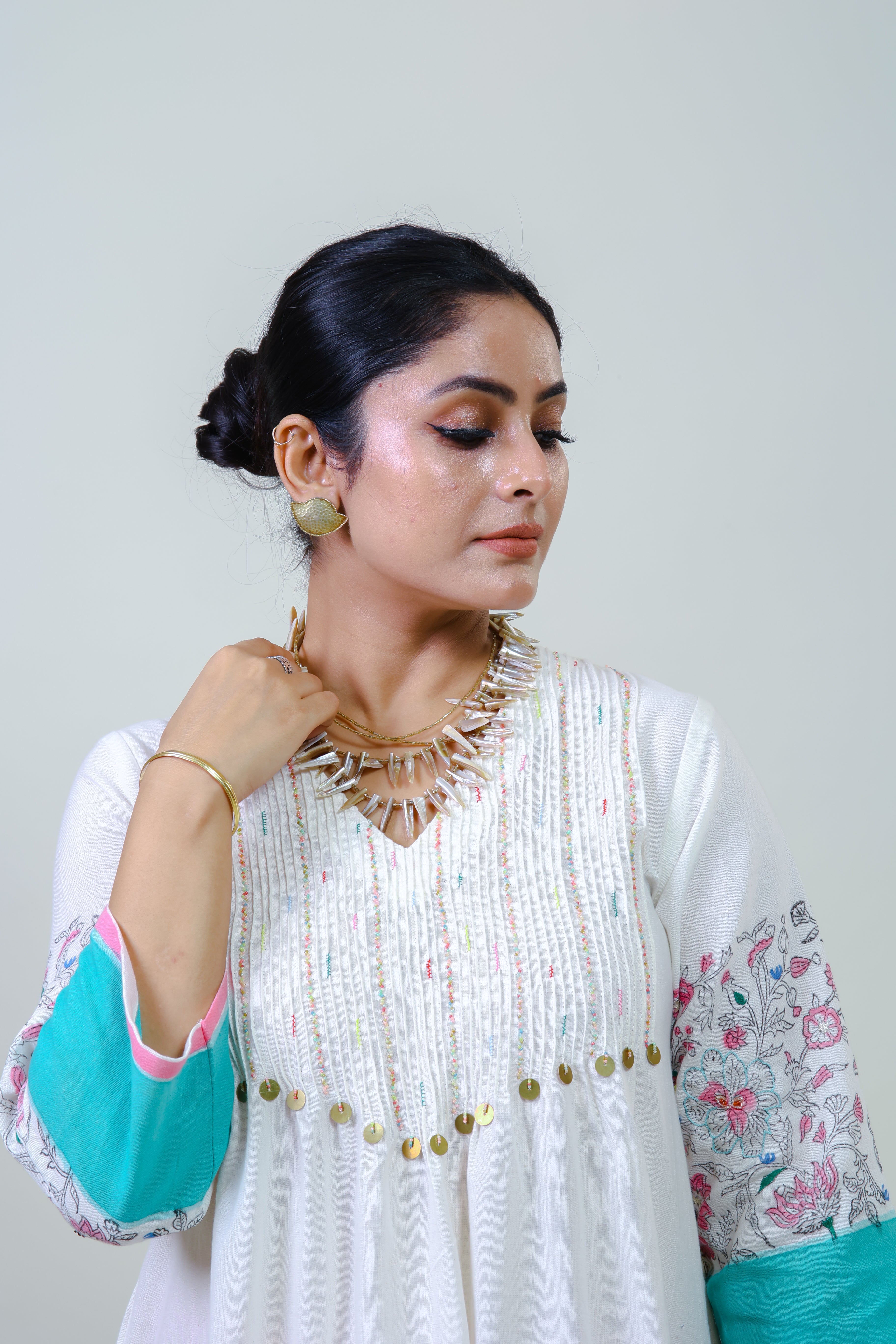 White pintucked printed border bloom kurta