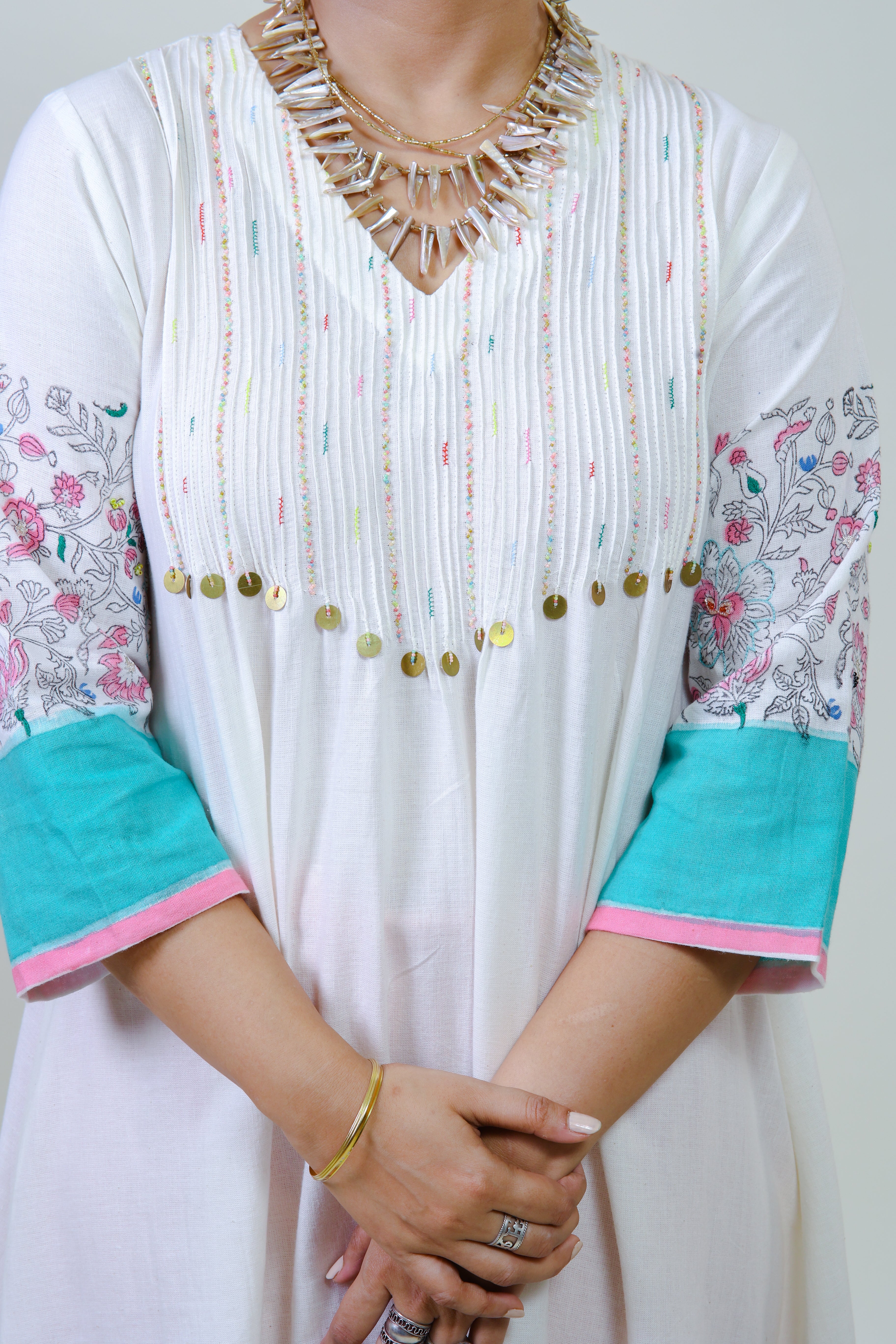 White pintucked printed border bloom kurta